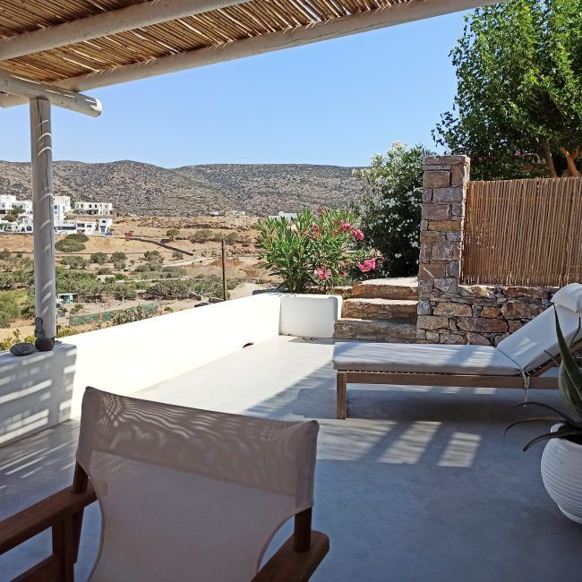 Outdoors there is a private terrace appointed with a built-in lounges and dinning area while the view of the Aegean Sea is breathtaking..