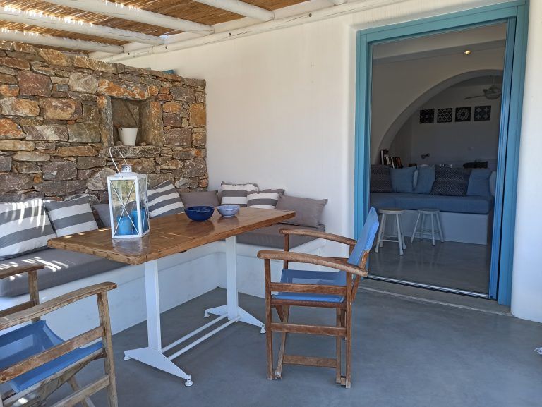 kykladonisia-Outdoors-private terrace Outdoors there is a private terrace appointed with a built-in lounges and dinning area while the view of the Aegean Sea is breathtaking..